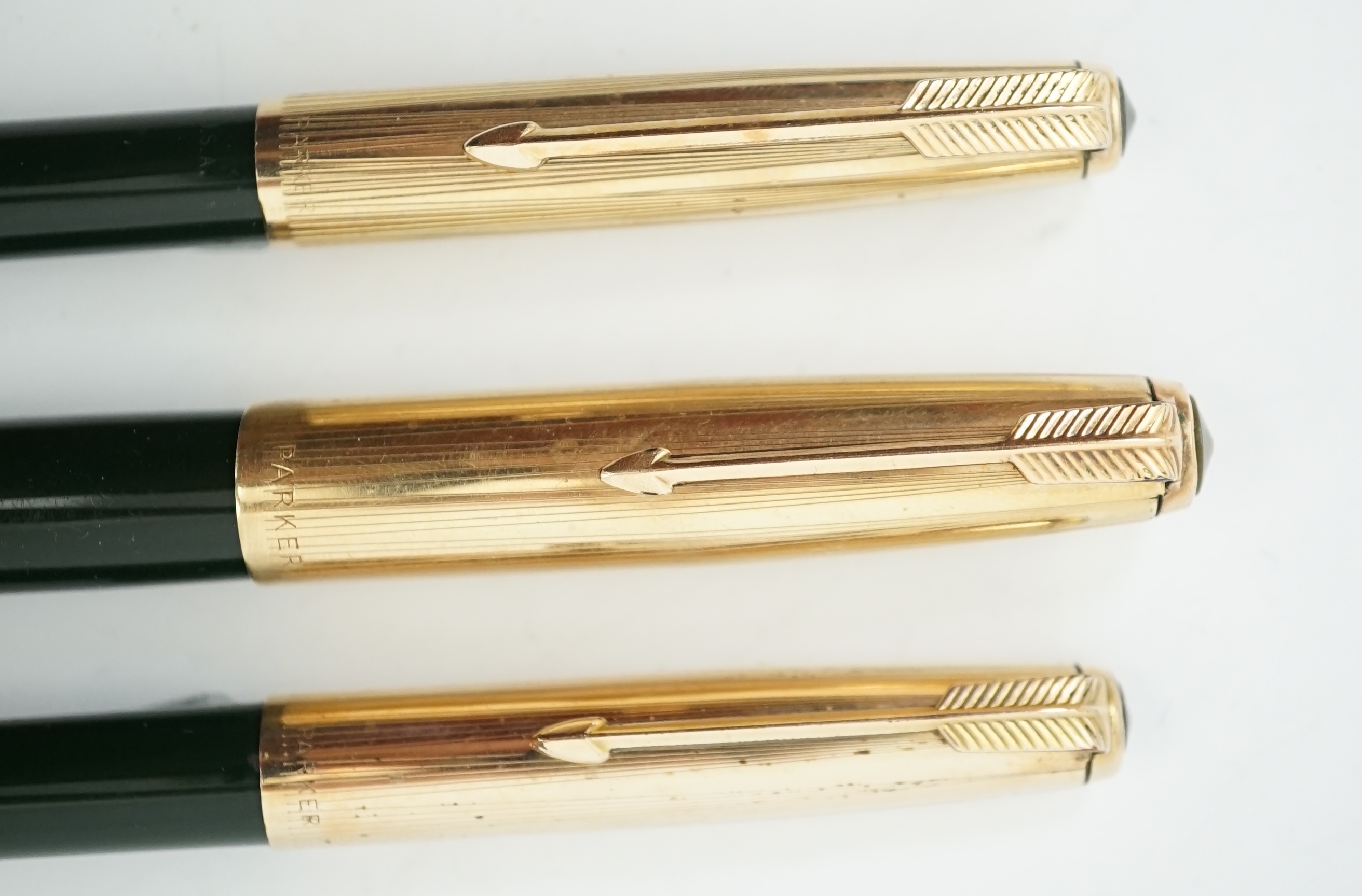 A Parker '51' Aerometric fountain pen, ball pen and pencil set in rare 'Forest Green'